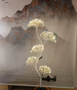 White firework tree light 120cm tall with segmented tree structure, emitting warm white light