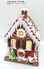 clay dough little Santa Claus standing in front of the house- 20