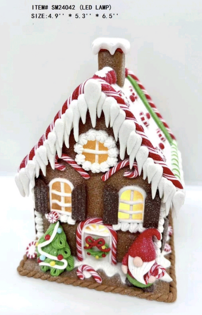 clay dough little Santa Claus standing in front of the house- 20