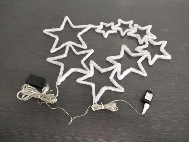 8 pcs brushed five-pointed stars with 128 white LED lights and an 8-function controller
