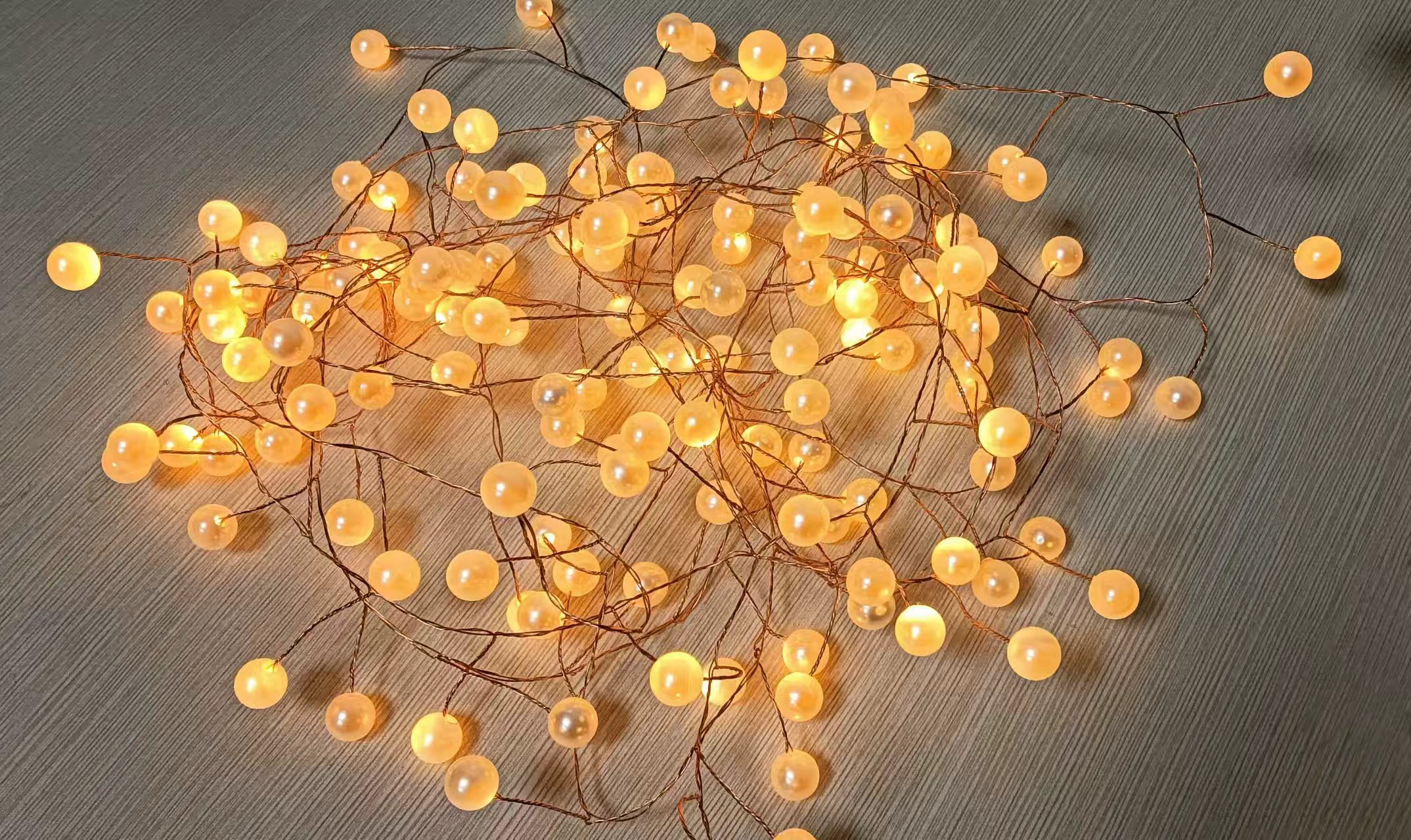Pearl Firecracker-Shaped Copper Wire Light String with 150 LED Bulbs, 3cm Spacing, Vintage Bronze Tone, Scroll Packaging for Festive/Decorative Use
