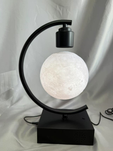 Black Base Magnetic Levitation 7-Color Crescent Moon Lamp with Bluetooth Speaker - Wireless Color-Changing Floating Light for Ambient Decor & Music Playback