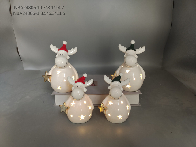 porcelain Reindeer with red / black hat gold star- 28